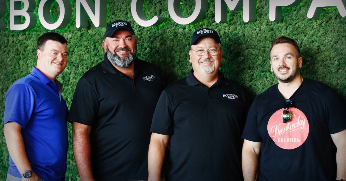 Four Guys at Bardstown Bourbon Company Green Wall