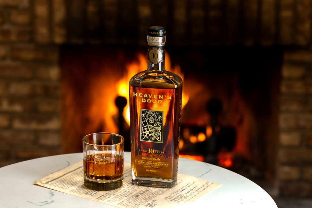 Heaven's Door Decades Series 1 Bourbon in front of a fire. Bob Dylan's Bourbon