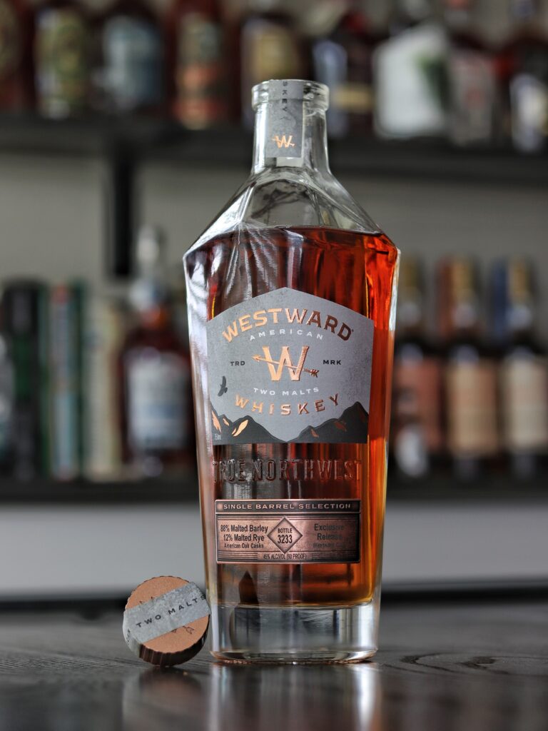 An uncorked bottle of Westward Whiskey Two Malts Rye