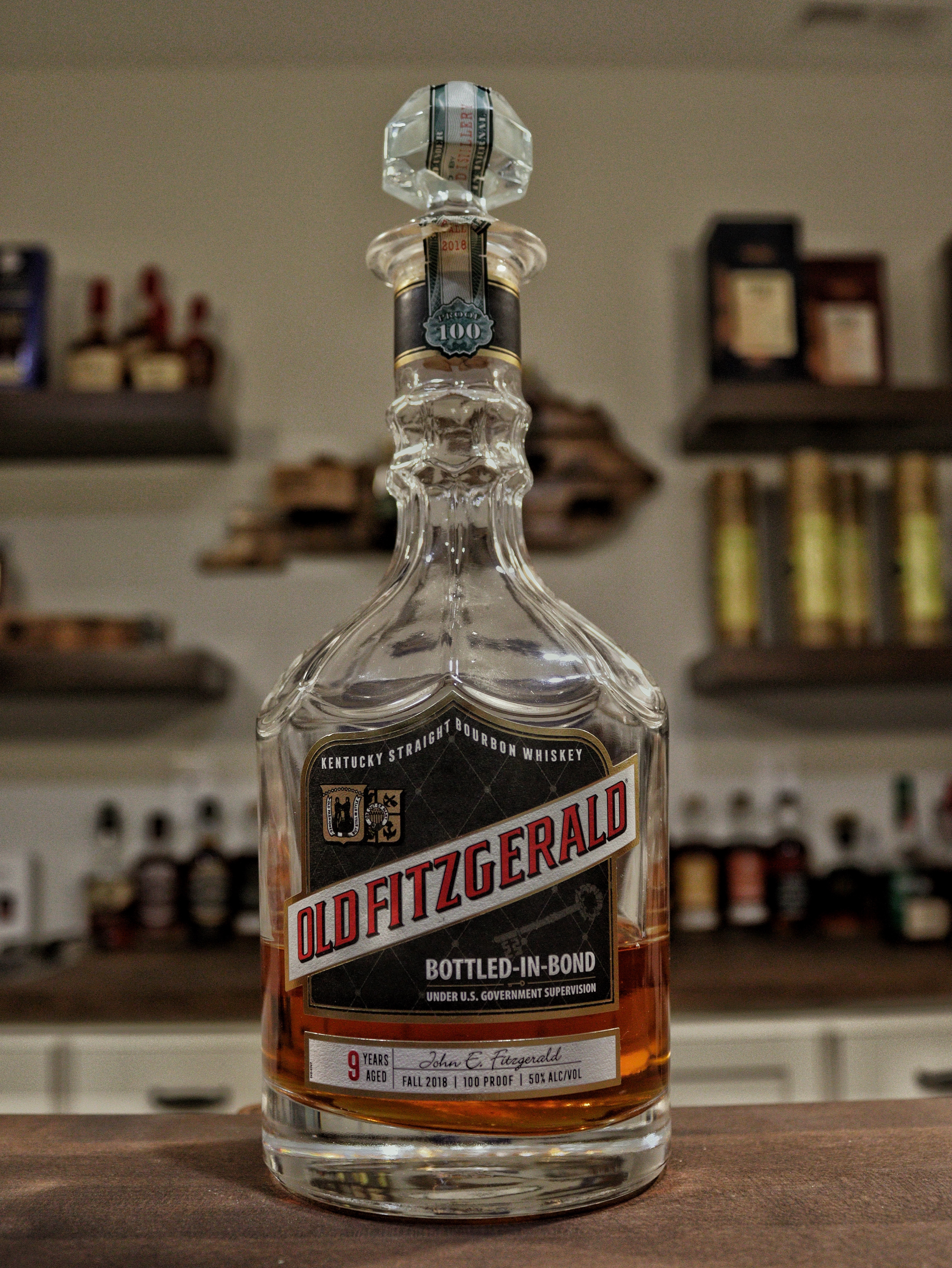Decanter bottle sitting on a bar