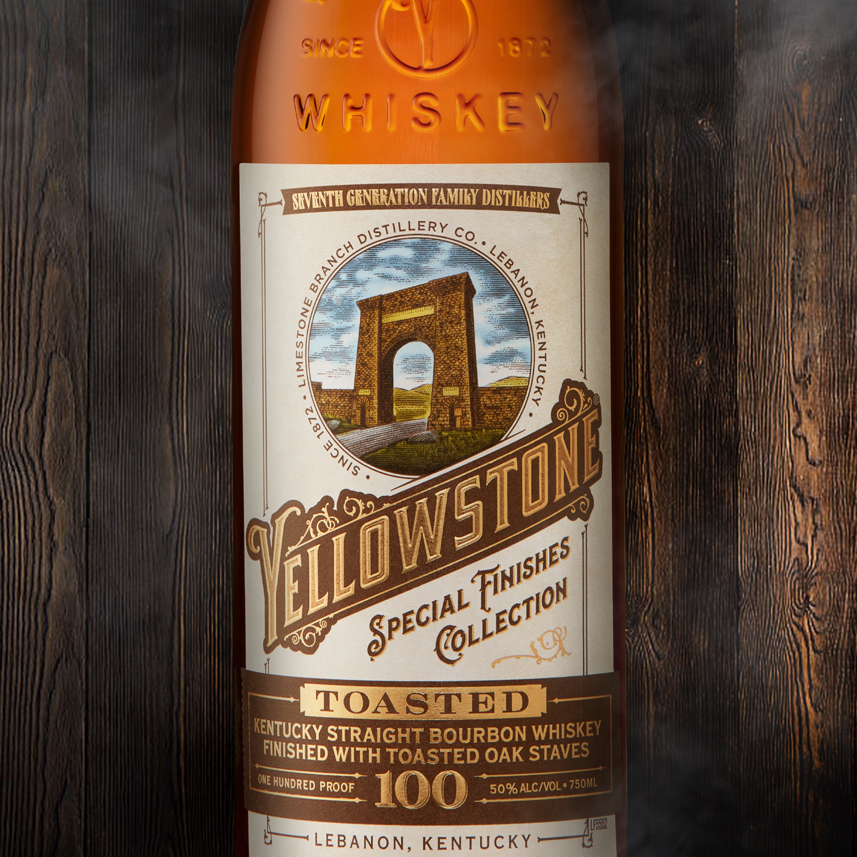 Yellowstone Toasted Barrel Bourbon with staves in the background