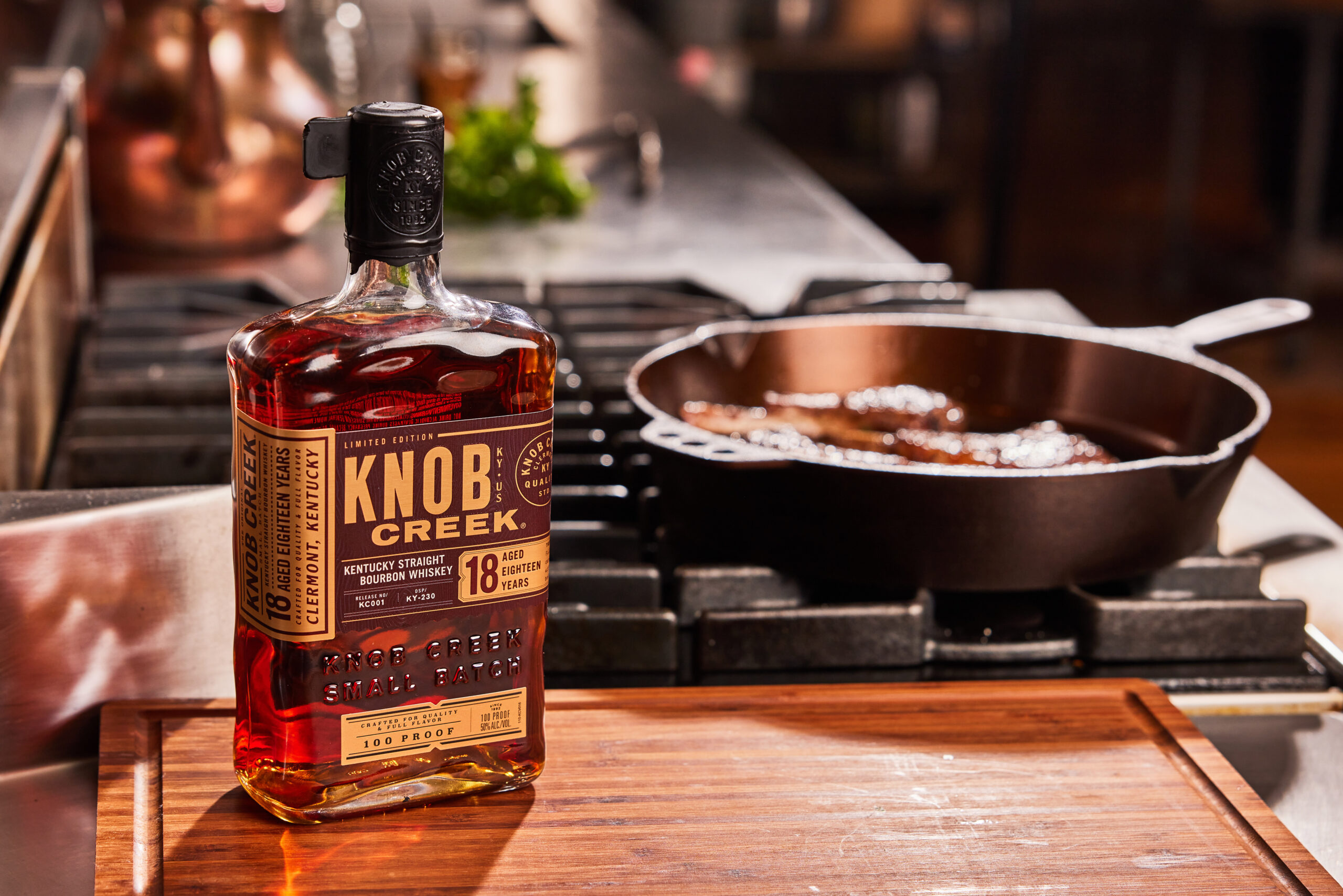 Knob Creek 18 with cask ironed skilled in a kitchen
