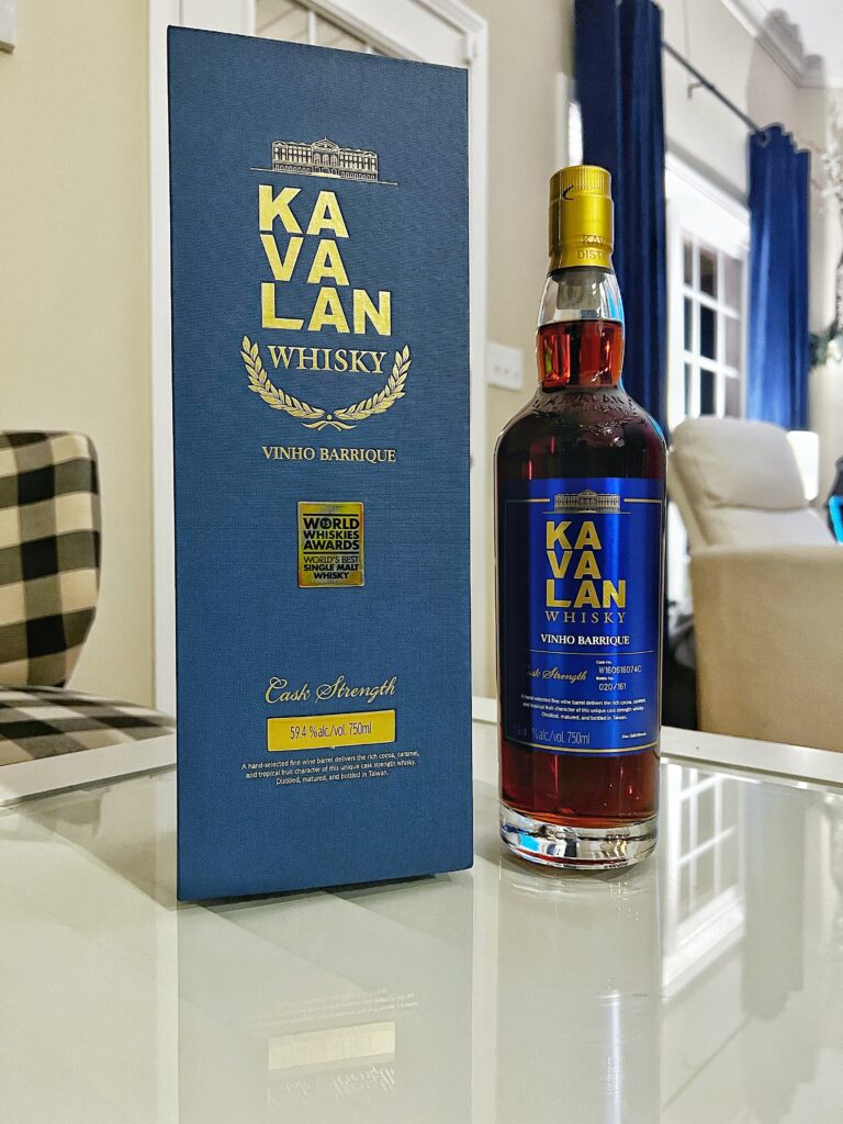 Kavalan VINHO on a coffee table with chair in the background