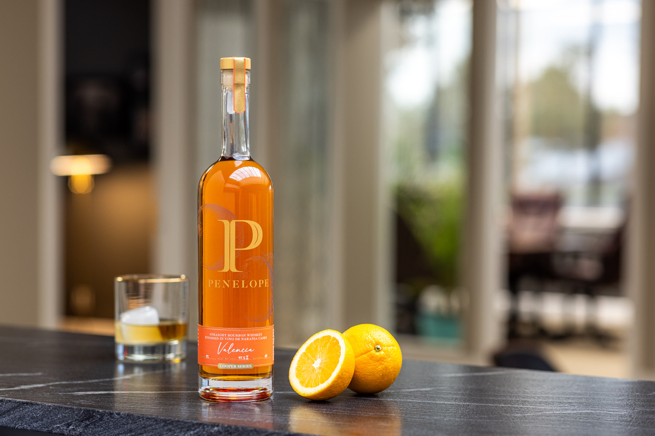 Penelope Valencia Bourbon bottle showcasing the fusion of American bourbon with Spanish Vino de Naranja casks, highlighting its rich citrus notes.