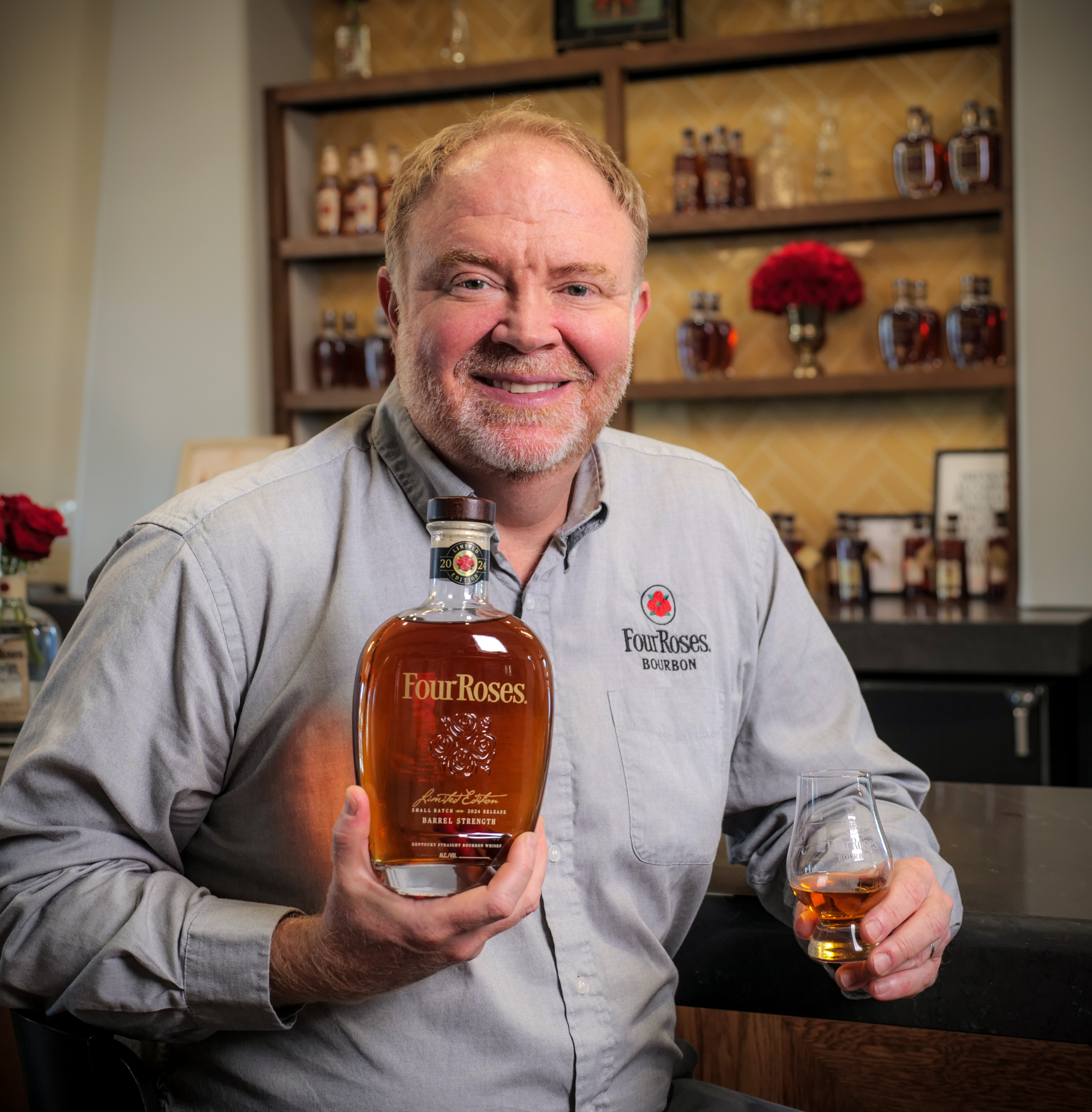 Brent Elliott Master Distiller of Four Roses Bourbon Holding a Bottled of 2024 Limited Edition Small Batch