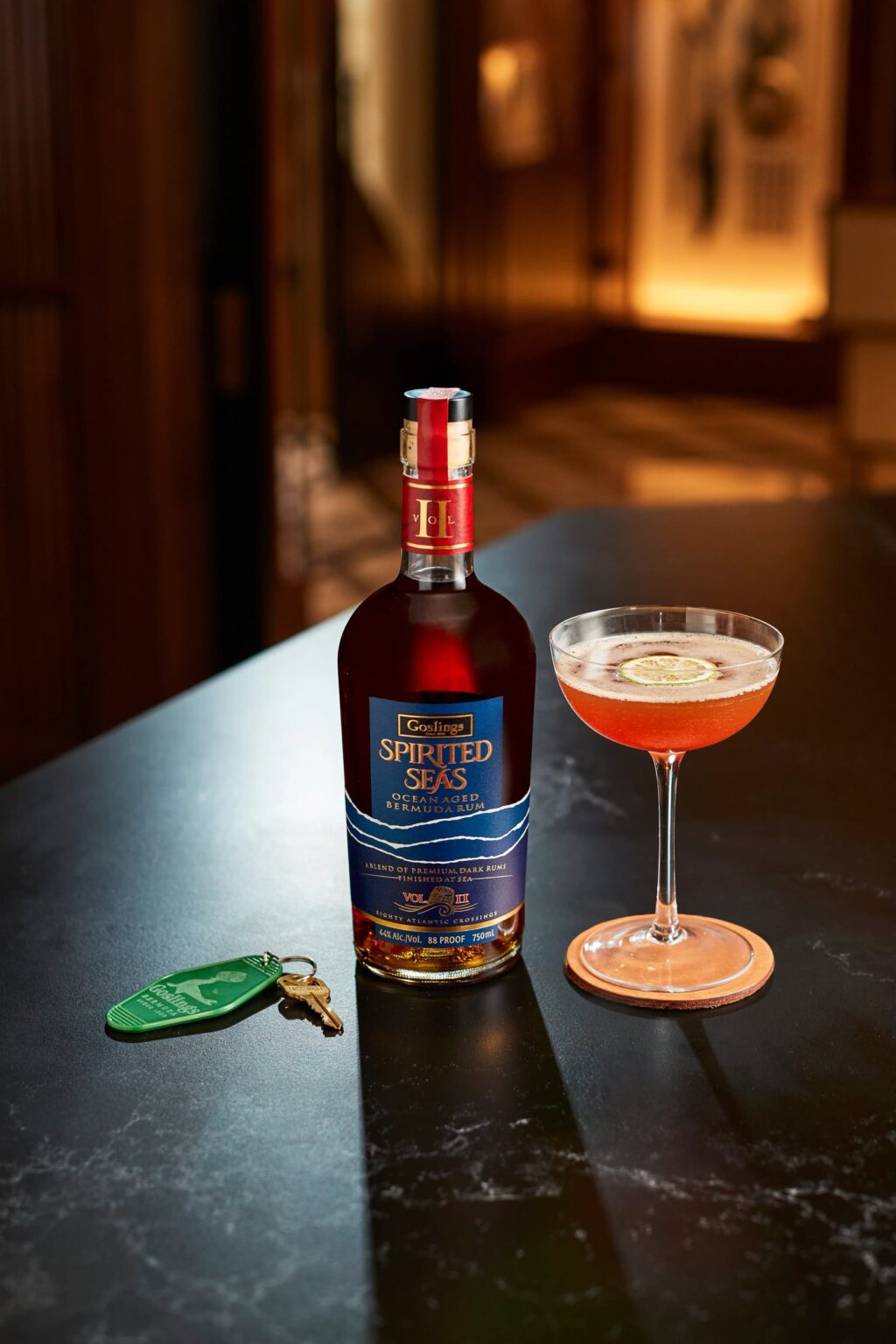 Bottle with a cocktail and key