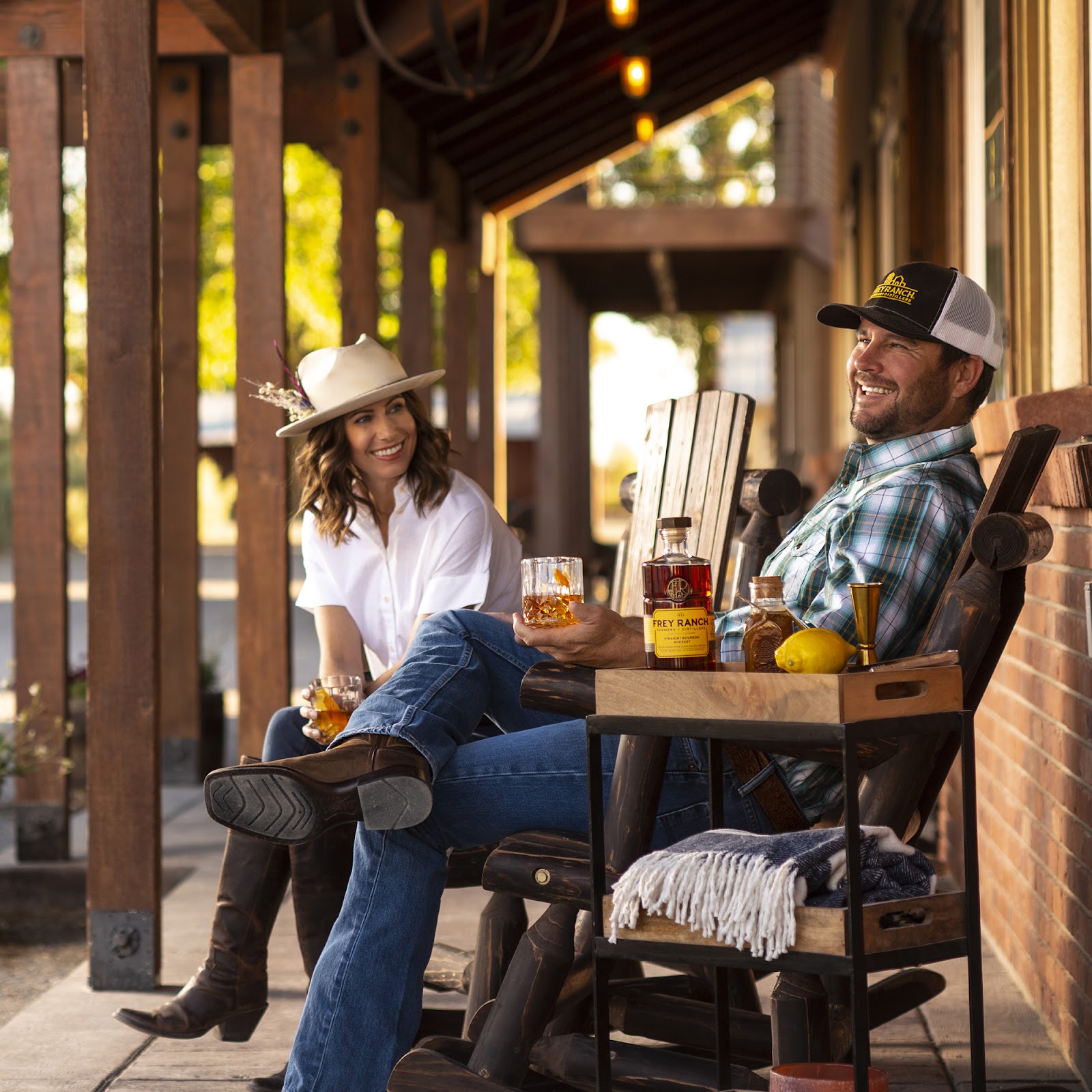 Two people sitting in rocking chairs