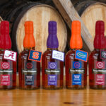 Five bottles of Evan Williams promoting Colleges across the country.