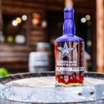 Lady Bird from Garrison Brothers set on a barrel