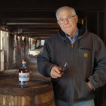 Eddie Russell in the rick house with Russell Reserve 13