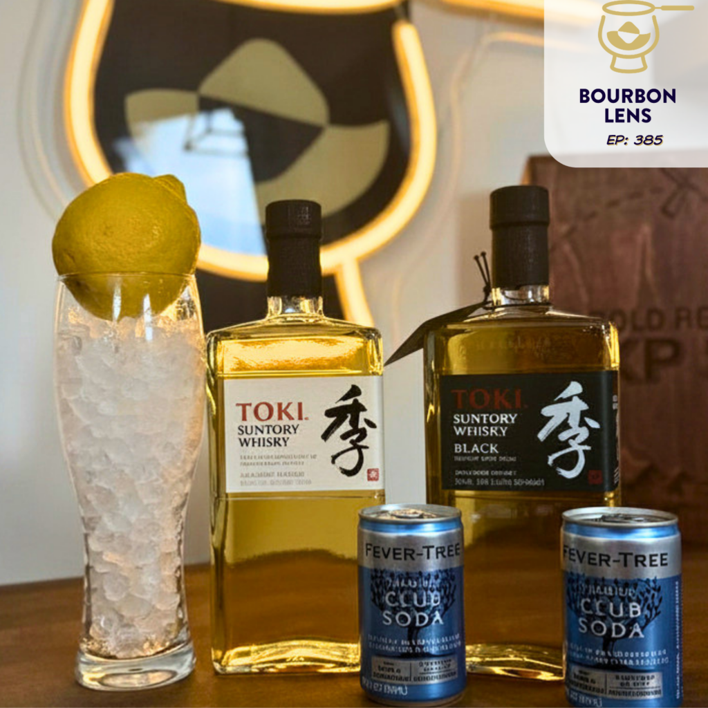 Toki White and Toki Black with a glass of ice, lemon, and two cans of soda water.